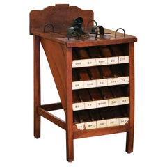 Juego francés de lanzamiento de monedas "La Grenouille" de principios del siglo XX con 11 discos de hierro