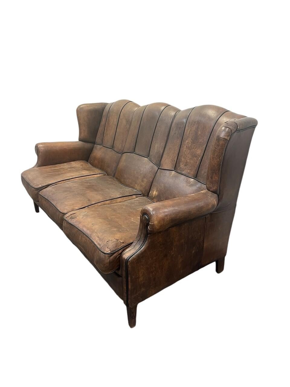 Early 20th Century French Leather Art Deco Club Sofa, Sofa has a great distressed look. All original condition. Please view pictures
