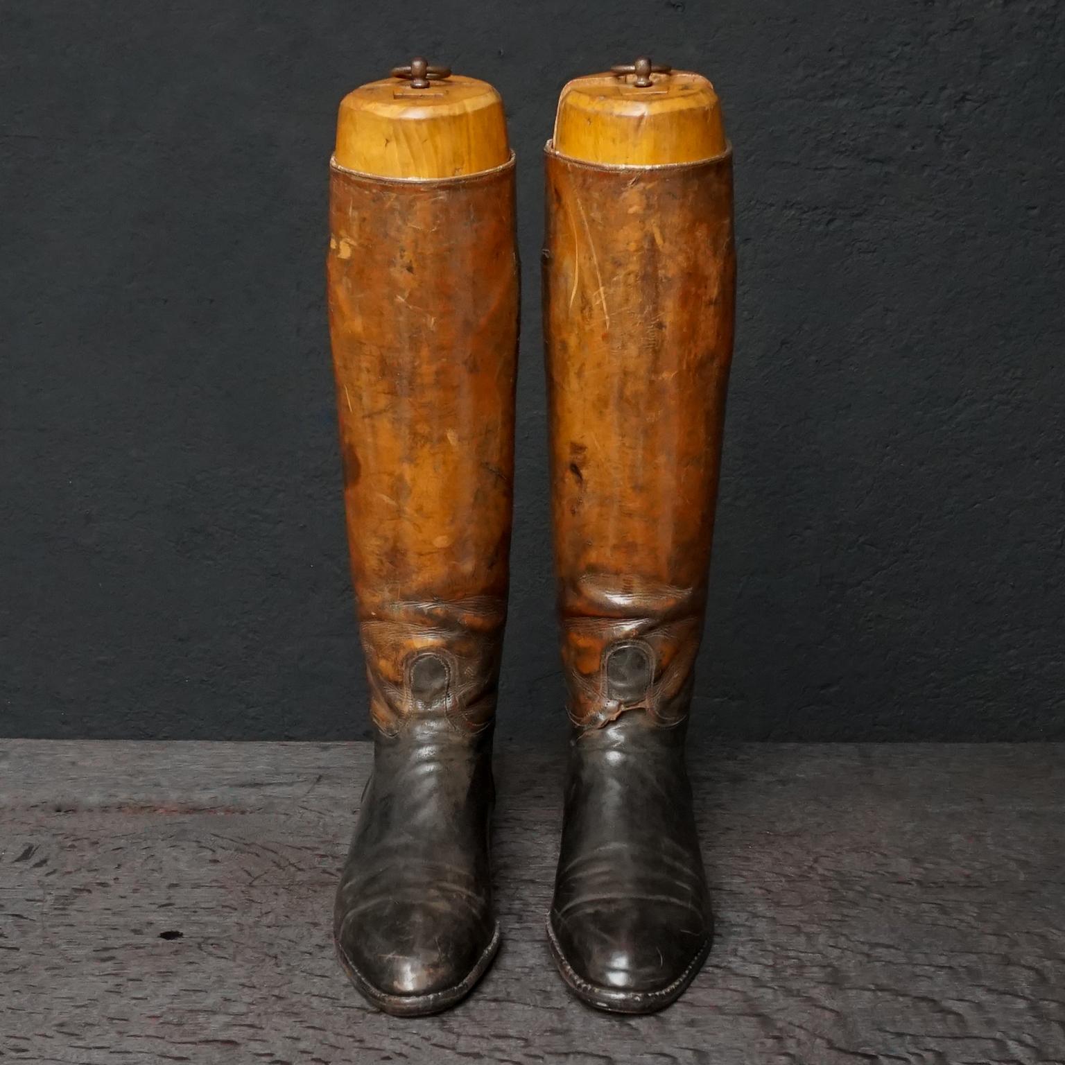 This pair of French heavily weathered two-tone men's horse riding boots have a great look to them. 
They come with Boot Trees marked G and D, gauche and droite, French for left and right.
I love the two-tone coloured leather, I wish I could wear