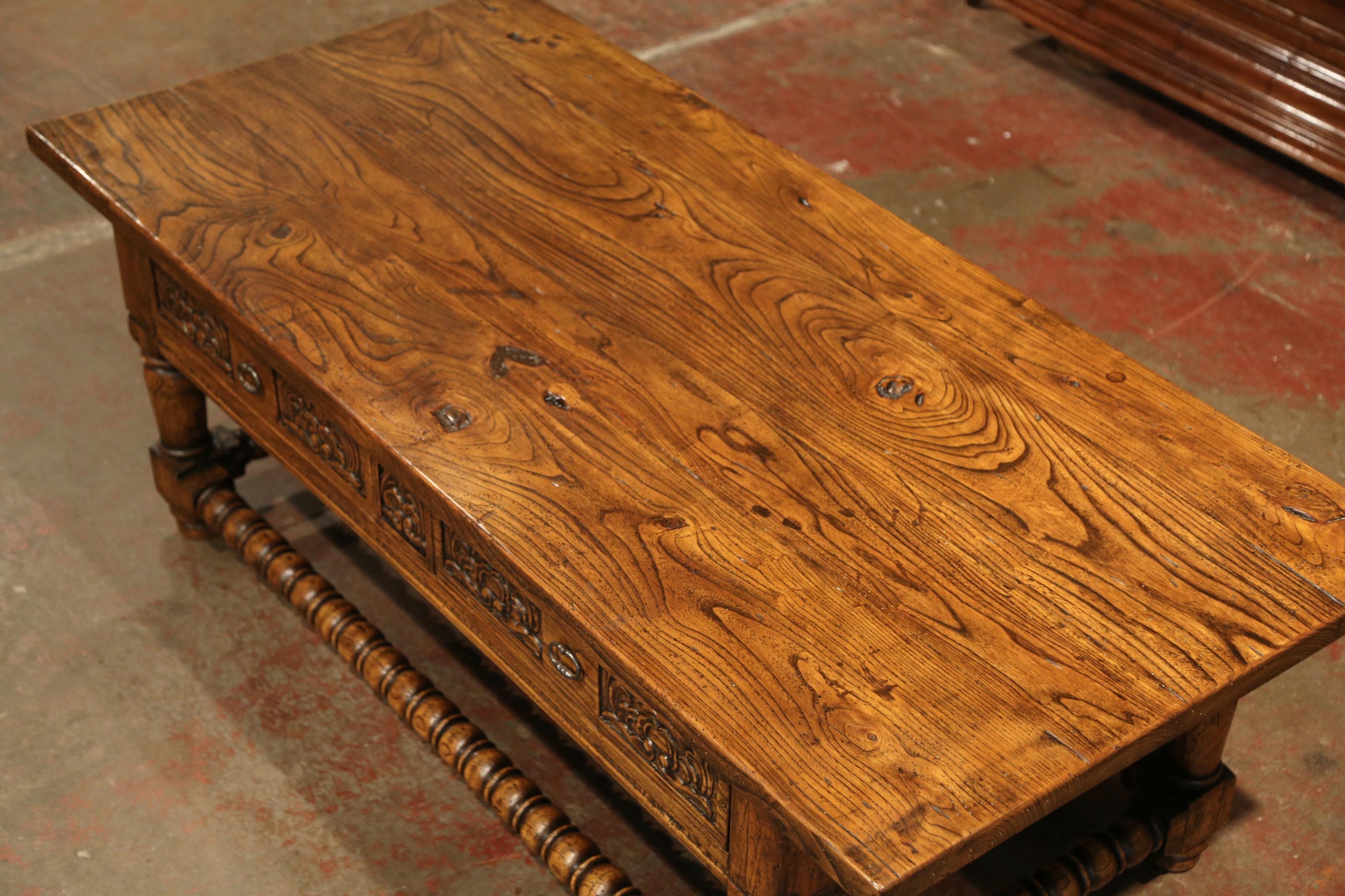 Patinated Early 20th Century French Louis XIII Carved Chestnut Coffee Table with Drawers