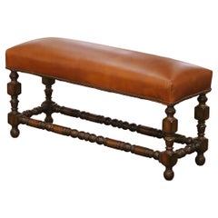 Early 20th Century French Louis XIII Style Walnut Bench with Leather Seat