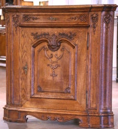 Early 20th Century French Louis XIV Carved Oak "Encoignure" or Corner Cabinet