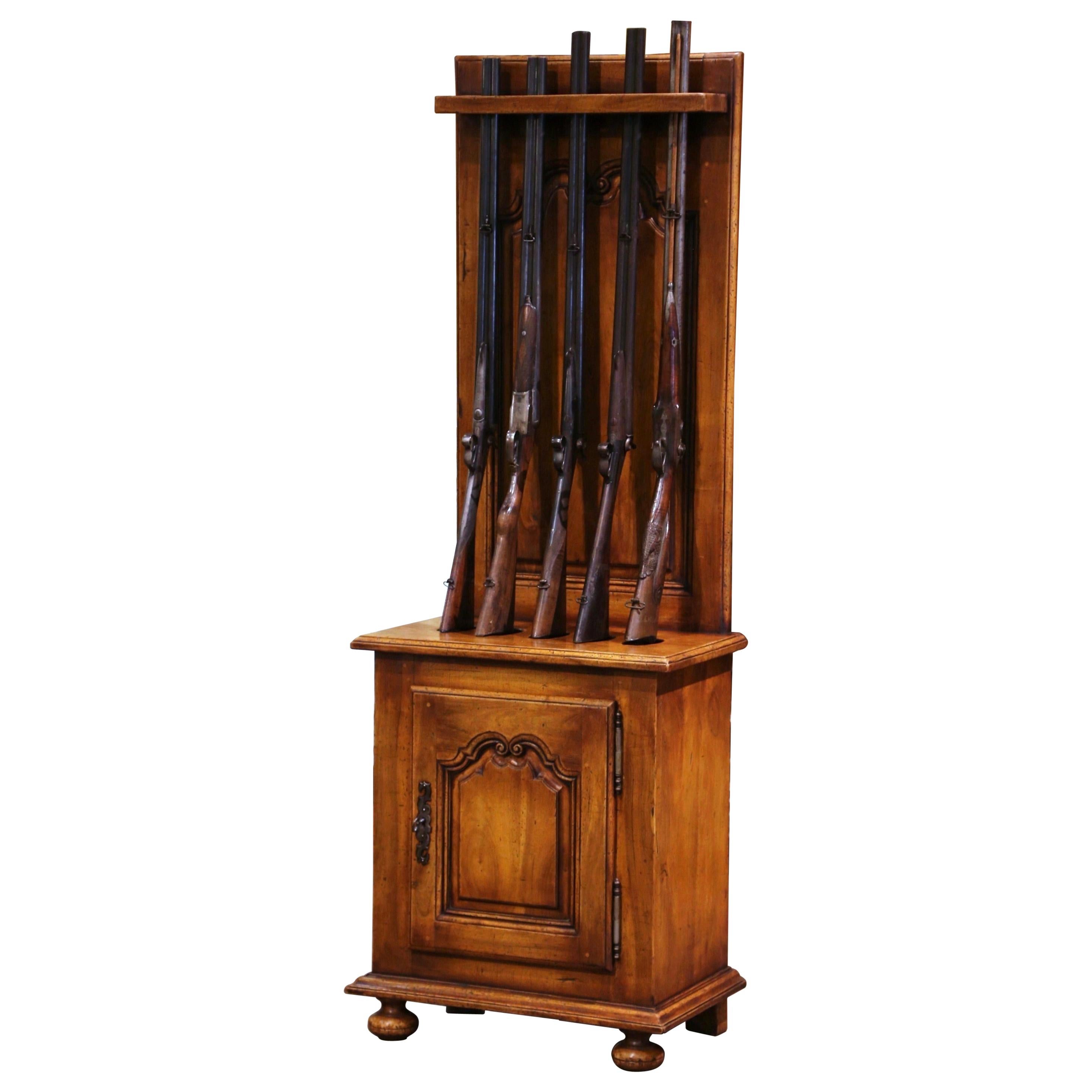 Early 20th Century French Louis XIV Carved Walnut Gun Display Cabinet