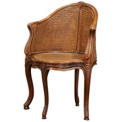 Early 20th Century French Louis XV Carved and Double-Cane Desk Armchair