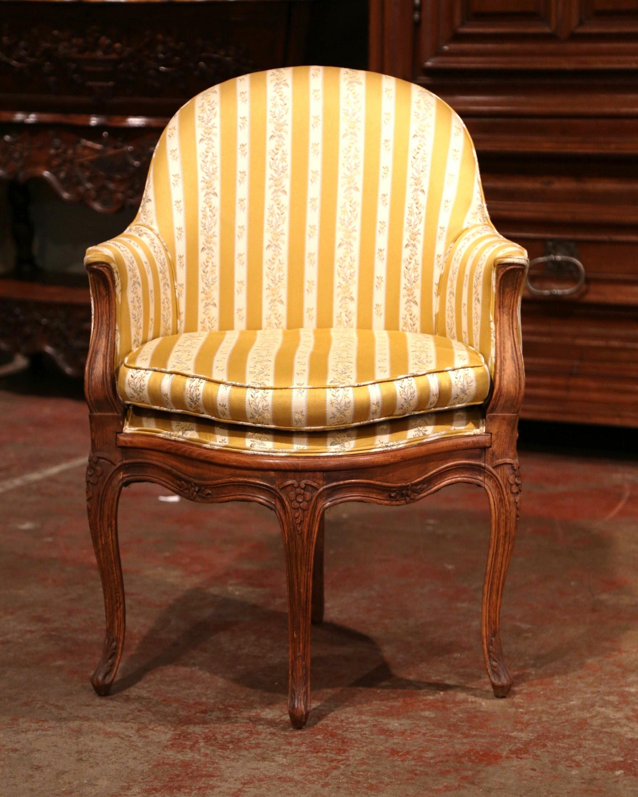 Decorate a study or office with this elegant antique desk chair. Crafted in Provence, France, circa 1900, the corner chair has an arched and curved back for ultimate comfort. The Baroque, Louis XV armchair stands on four carved, cabriole legs