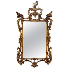 Espejo de pared francés de principios del siglo XX, estilo Luis XV, de madera tallada y dorada