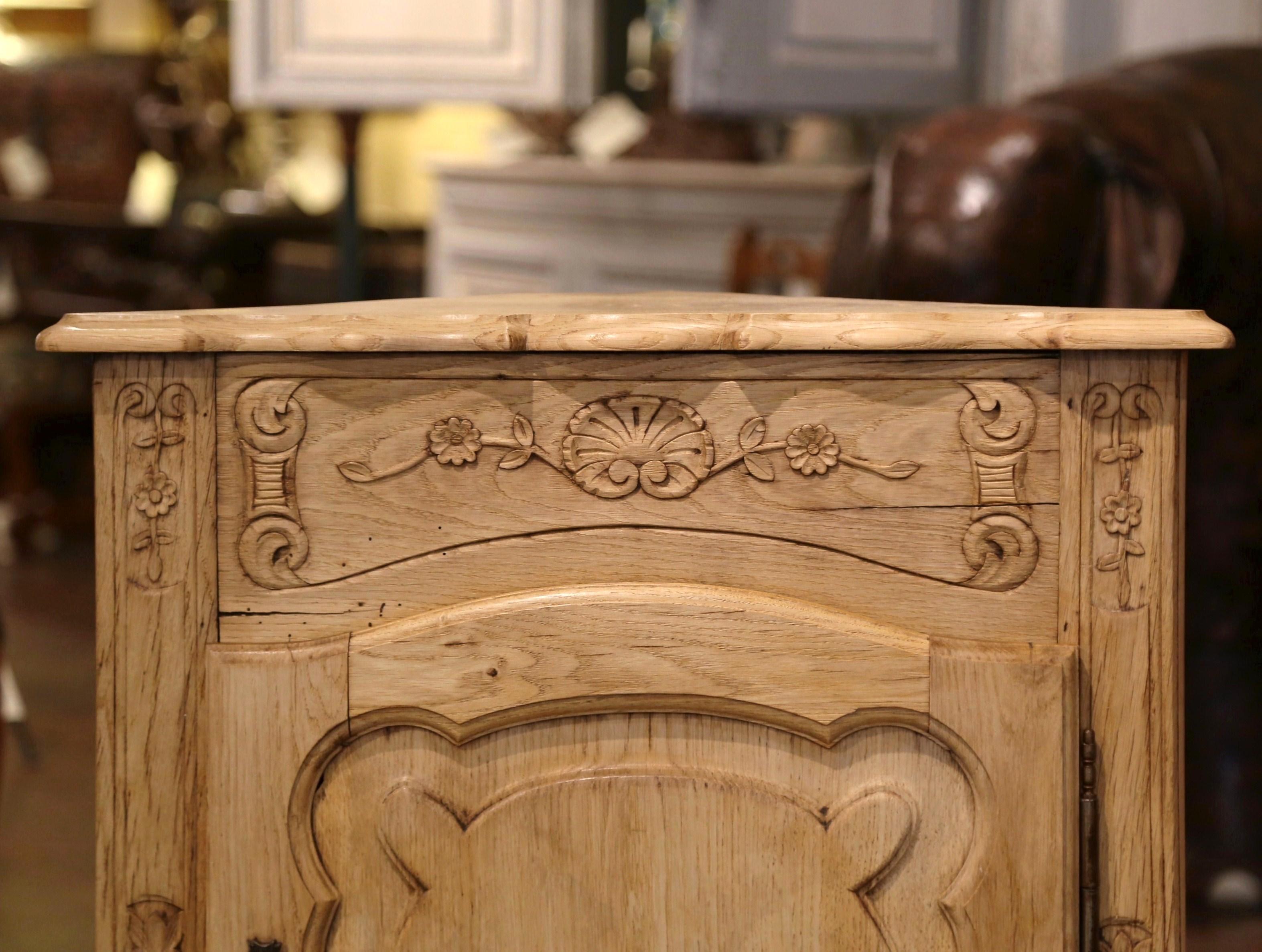 Patinated Early 20th Century French Louis XV Carved Oak Corner Cabinet from Normandy