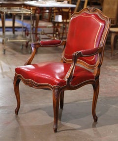 Early 20th Century French Louis XV Carved Walnut Desk Armchair with Red Leather