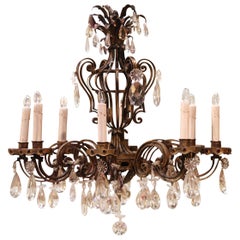 Early 20th Century, French Louis XV Gilt Iron and Crystal Eight Light Chandelier