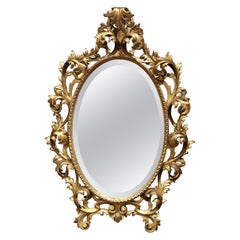 Early 20th Century French Louis XV Rococo Carved Giltwood Beveled Wall Mirror