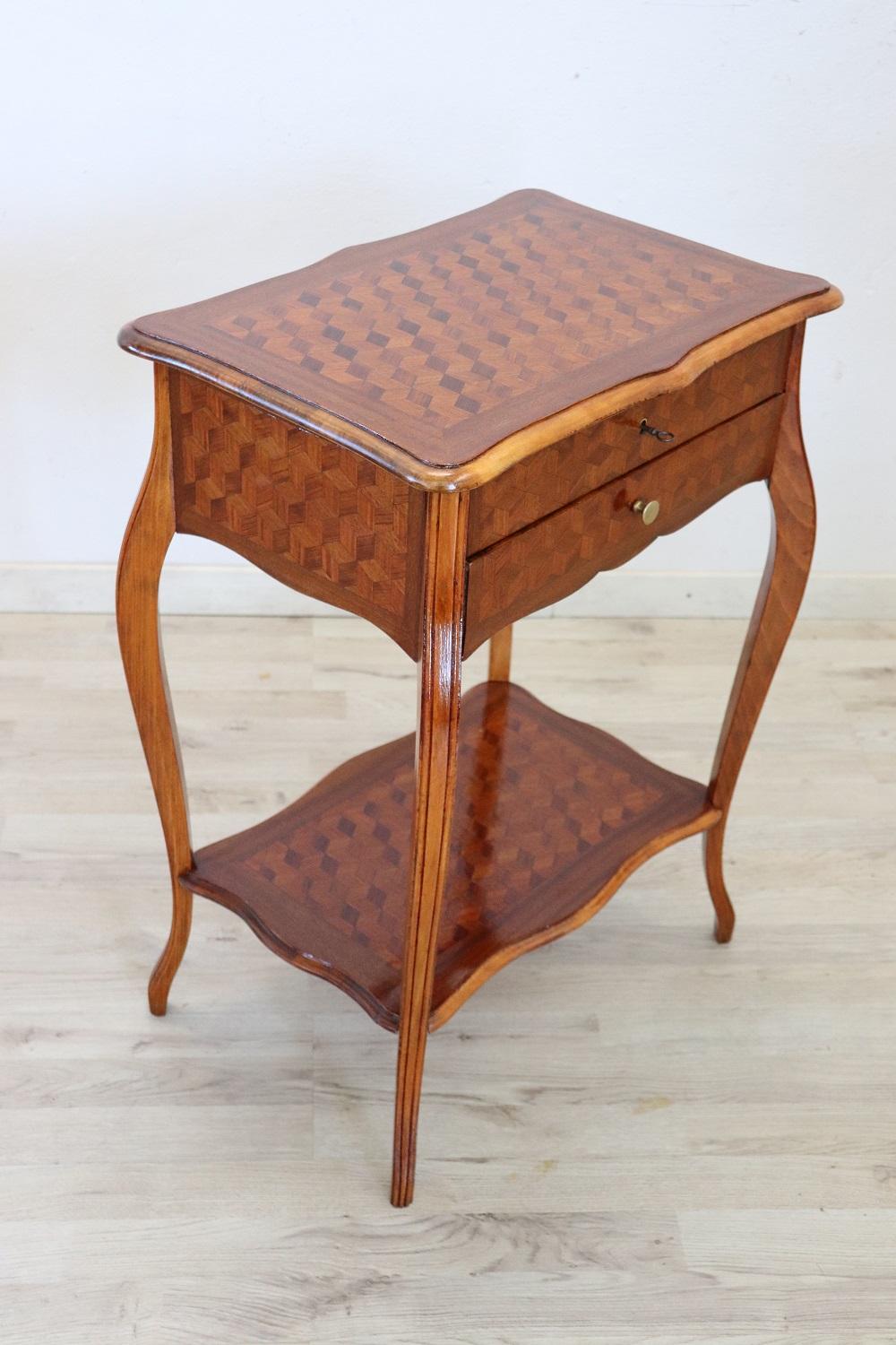Rare and fine quality French Louis XV style 1930s side table in inlay marquetry wood, the legs are long and slender. The decoration is on each side so you can place the tables also in the centre of the room. We advise you to look carefully at all