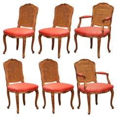 Early 20th Century French Louis XV Walnut Dining Room with Cane Back, Set of Six