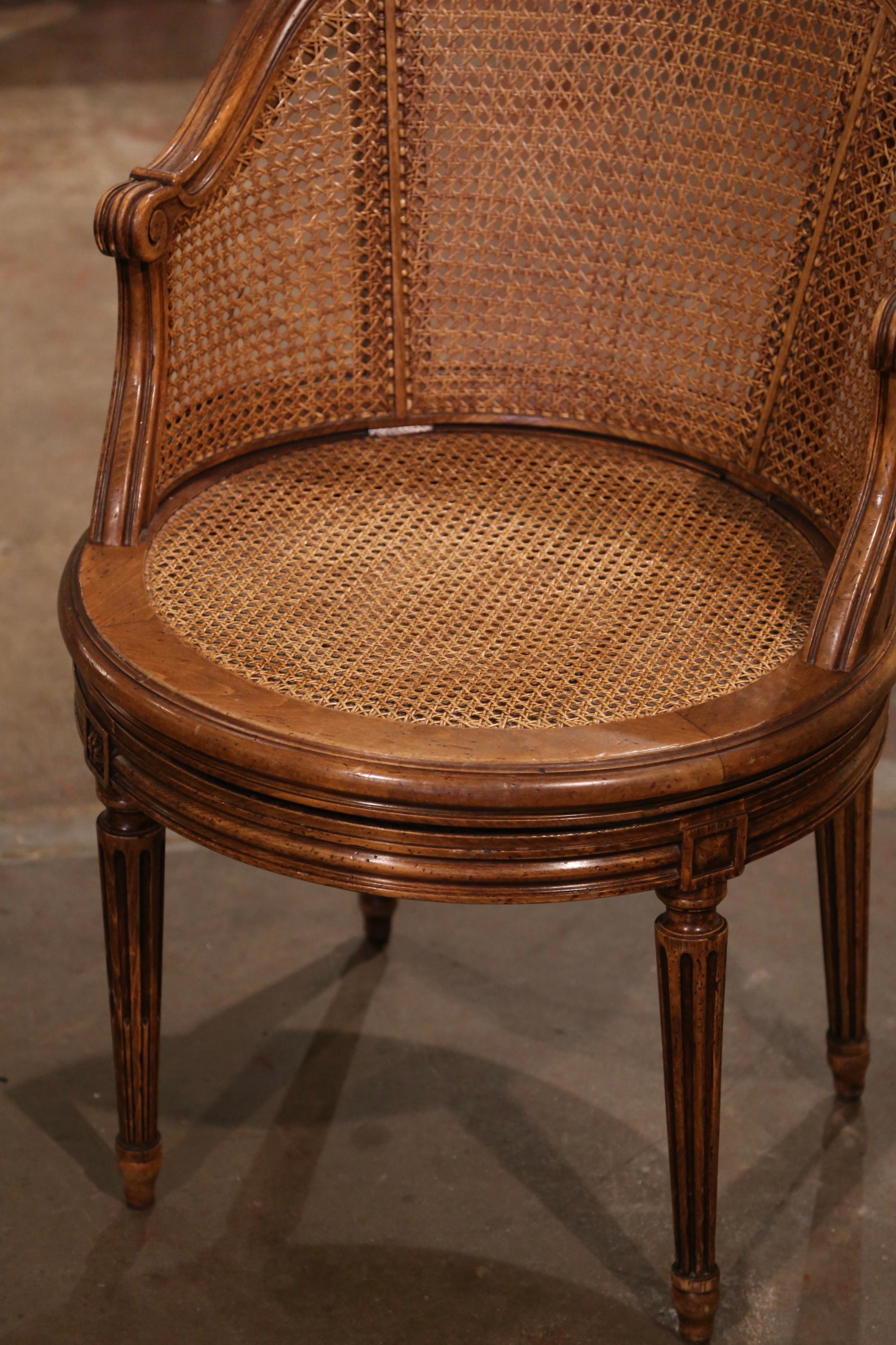 Hand-Carved Early 20th Century French Louis XVI Carved Walnut and Cane Swivel Desk Armchair 