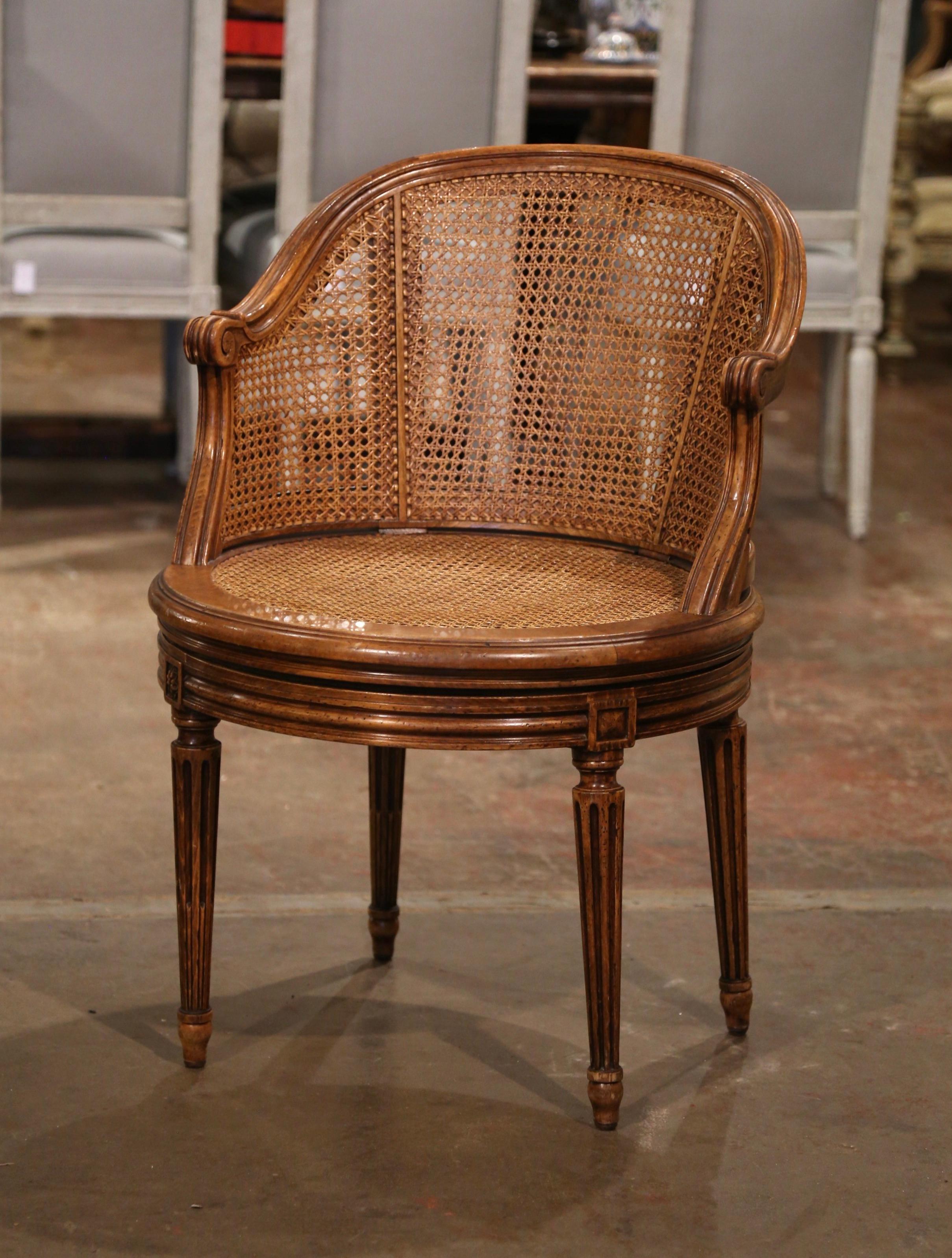 Early 20th Century French Louis XVI Carved Walnut and Cane Swivel Desk Armchair  In Excellent Condition In Dallas, TX