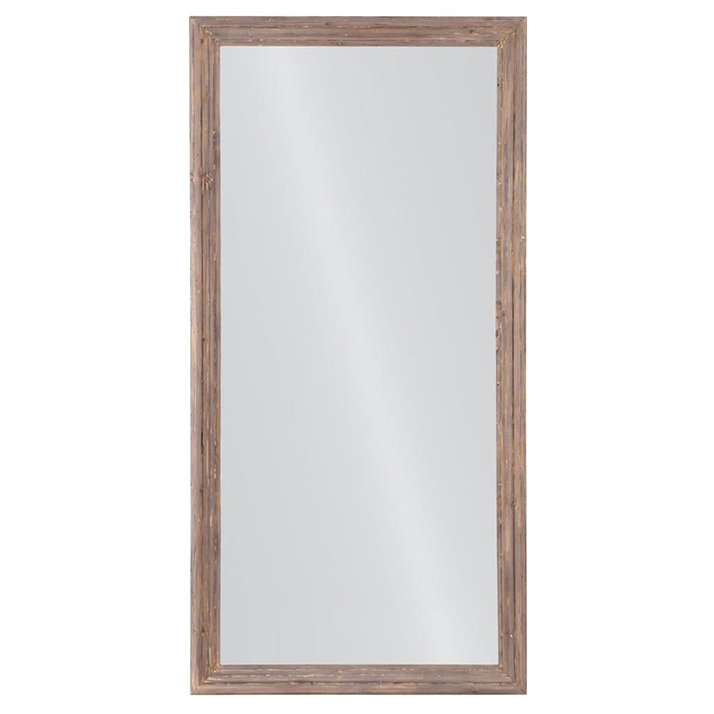 Miroir de sol à cadre moulé du début du 20e siècle.