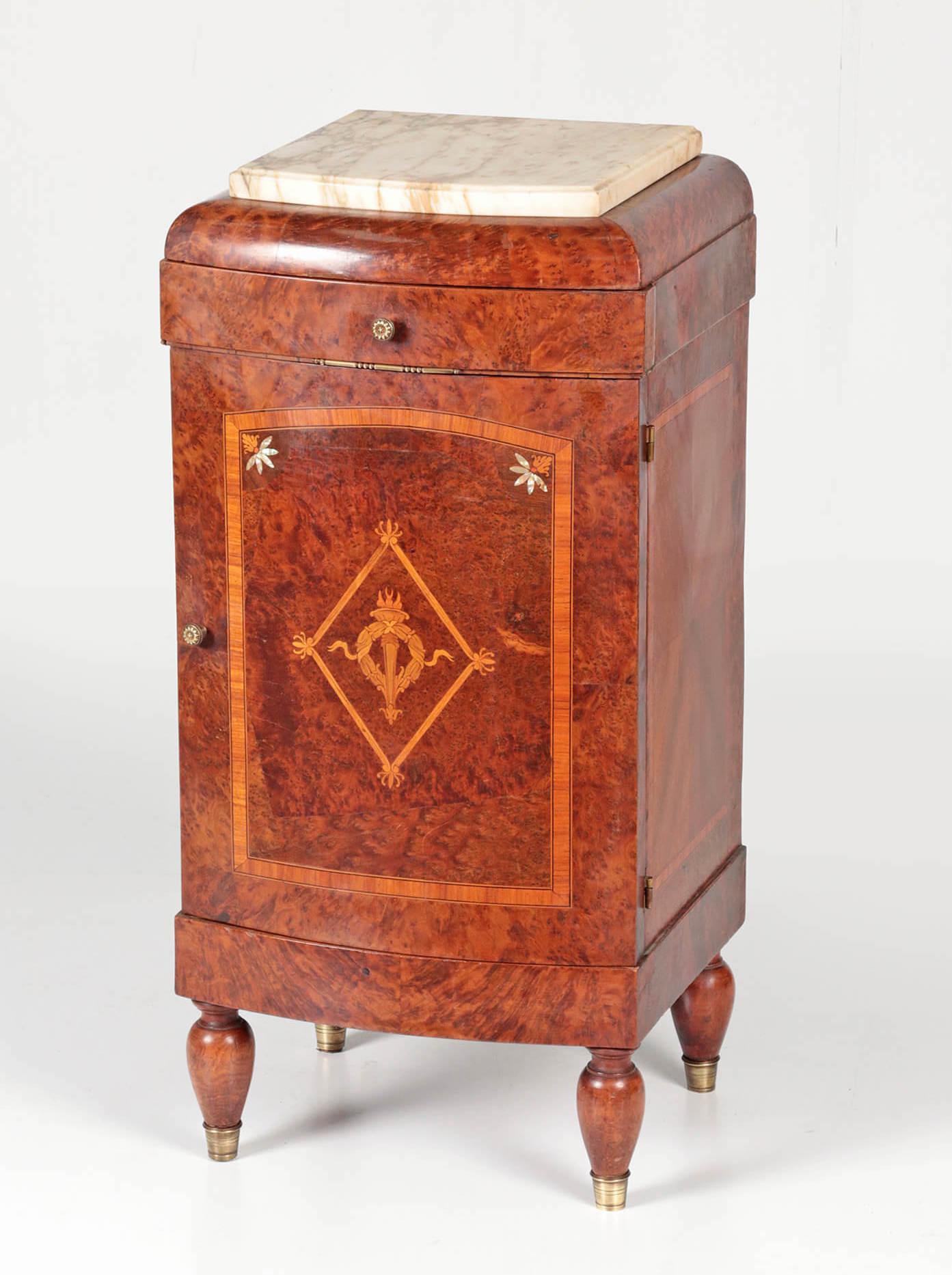 Beautiful antique bedside table, also nice to use as a side cabinet for a hall, for example. The cabinet is veneered with burr walnut and inlaid with mother of pearl. On top a marble plate. The cabinet has one drawer and the upper part of the inside