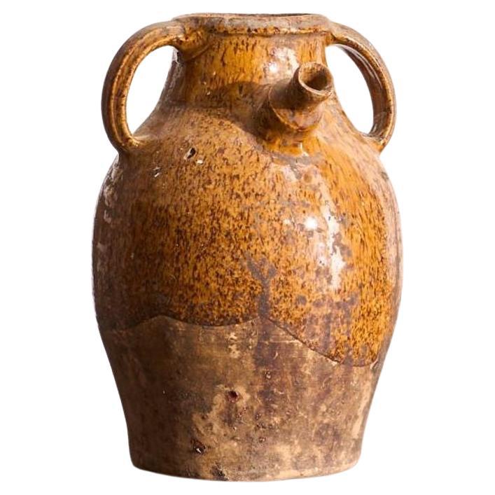 Early 20th century French nut oil jar- Brown glaze For Sale