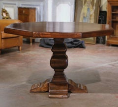 Early 20th Century French Octagonal Carved Walnut Dining Table on Pedestal Base