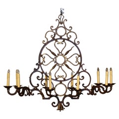 Early 20th Century French Painted Iron with Gilt Ten-Light Chandelier Early 20th Century French Painted Iron with Gilt Ten-Light Chandelier