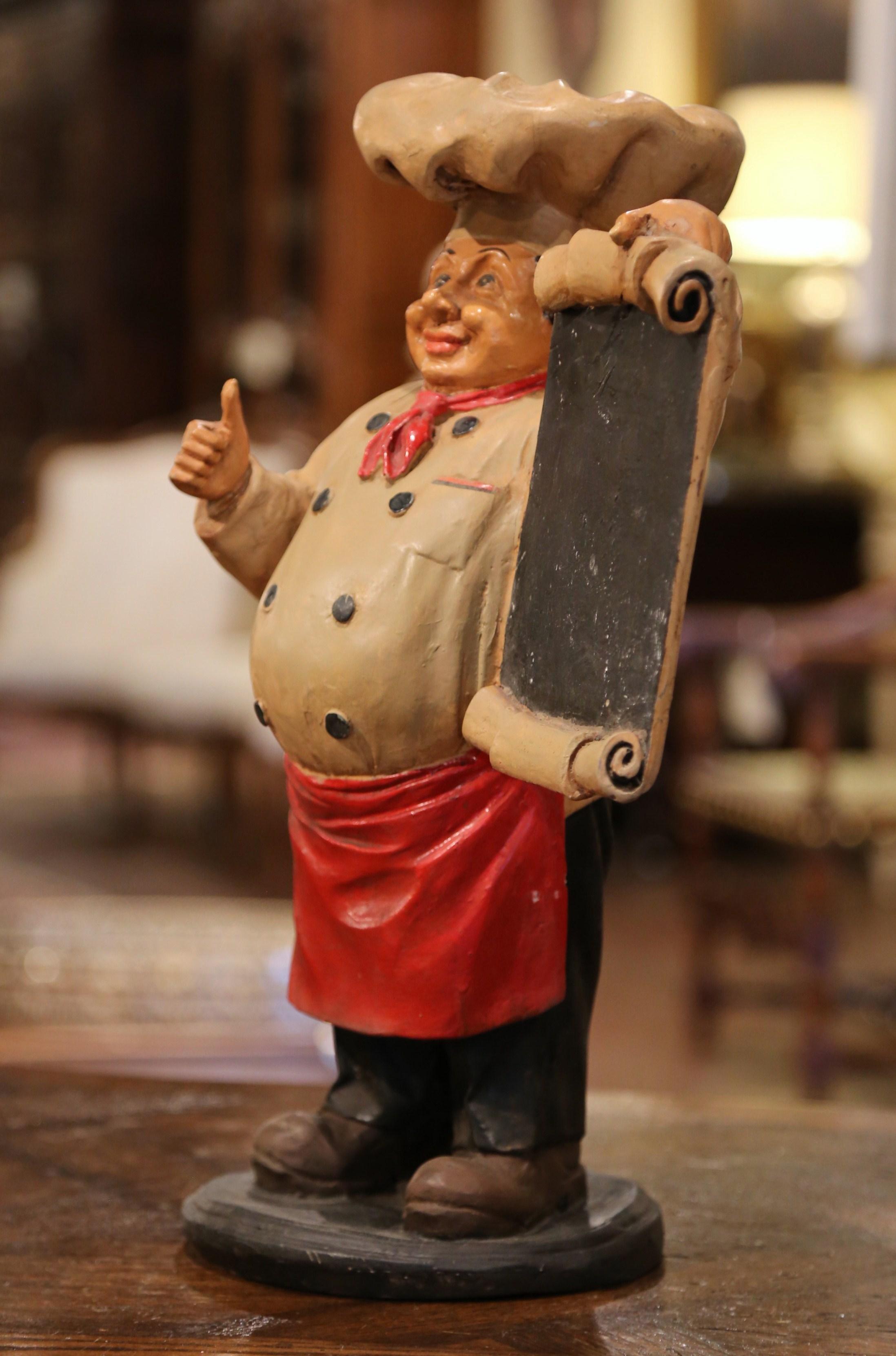 Decorate a kitchen counter with this colorful antique restaurant sign figure. Crafted in France, circa 1920, the piece made of 