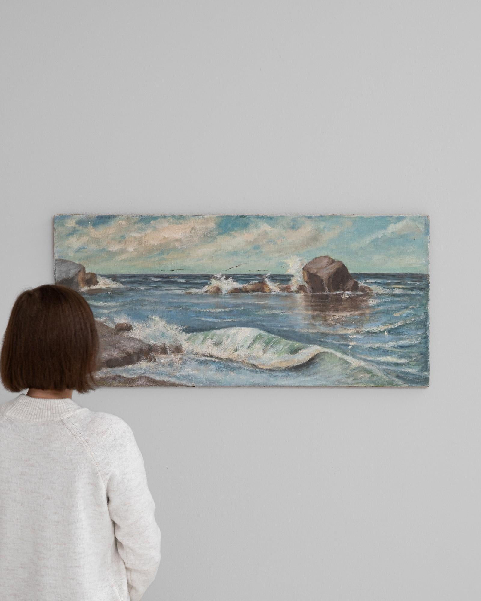Holen Sie sich den fesselnden Charme der französischen Küste in Ihr Zuhause mit diesem atemberaubenden französischen Gemälde aus dem frühen 20. Die Leinwand lebt von der turbulenten Schönheit des Ozeans, und jeder Pinselstrich fängt das dynamische