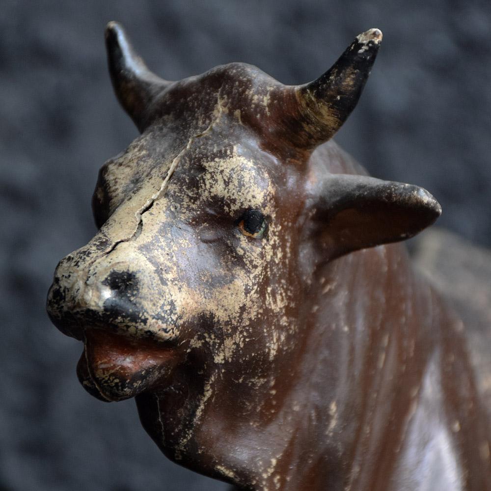 We are proud to offer an early 20th century figure of a papier mâché bull recently obtained from a French collector in Paris (France). The bull is a representation of a prize-winning fighting bull, the base of the figure is stamped with this