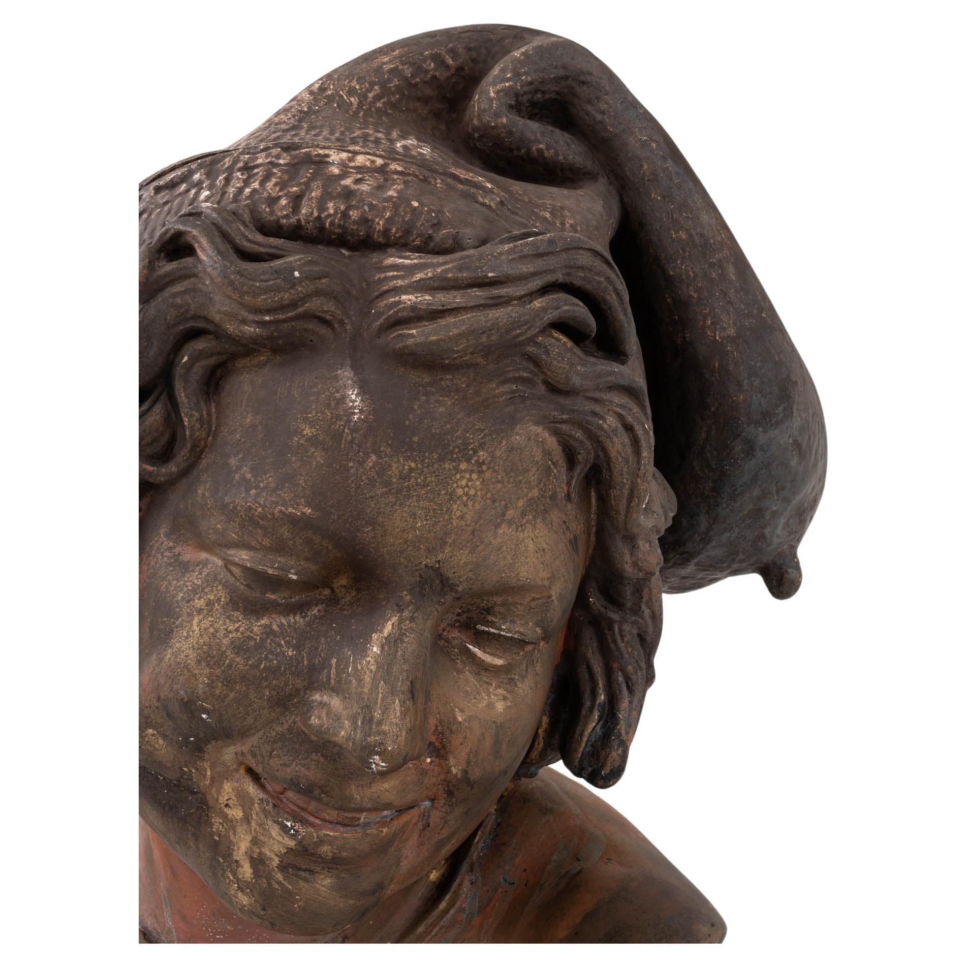 Step into the romantic past with our Early 20th Century French Plaster Bust, capturing the timeless allure of a young Neapolitan fisher boy. Crafted with exquisite detail, this captivating piece exudes the charm and grace of a bygone era. Adorned