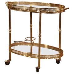 Early 20th Century French Polished Brass Two-Tier Oval Bar Cart on Wheels