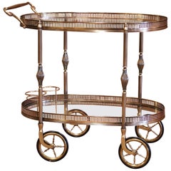 Early 20th Century French Polished Brass Two-Tier Oval Bar Cart on Wheels