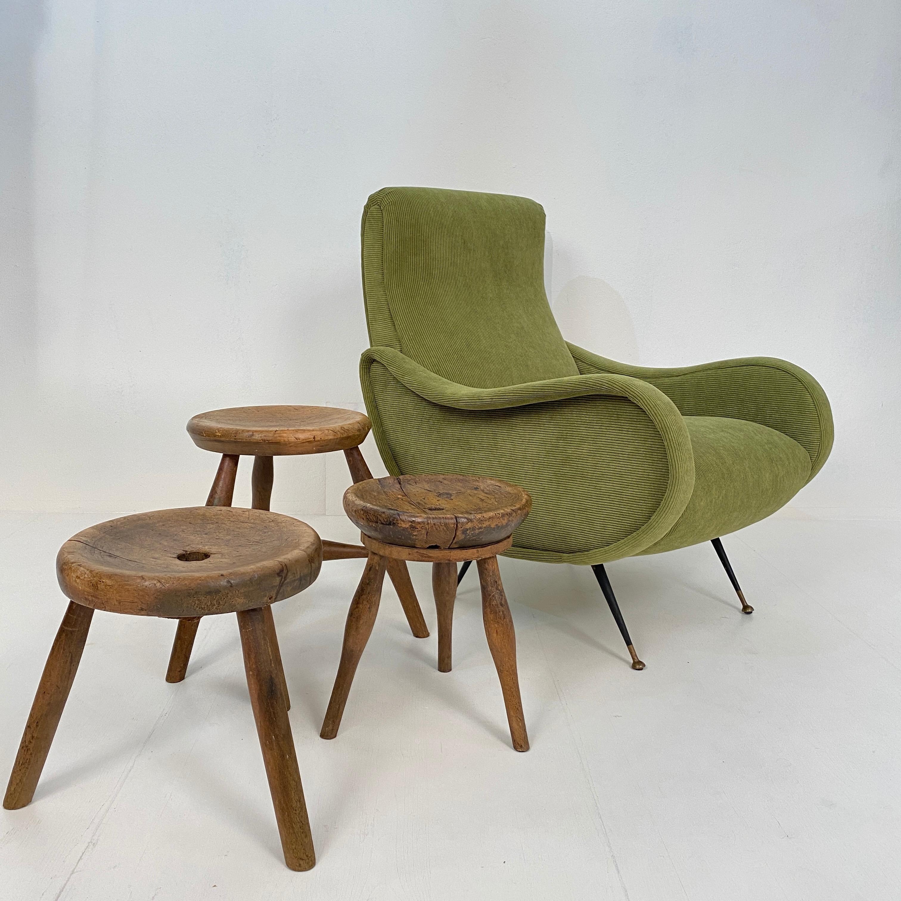 This milking splayed leg wood stool was made circa 1900 in Germany.
The seat is carved out of a solid piece of ash and the 3 legs are made out of beech.
And it has this fabulous Wabi Sabi look and beautiful Patina.
It is in its original condition. A