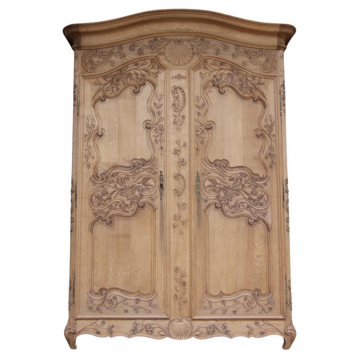 Early 20th Century French Provincial Armoire in Stripped Oak