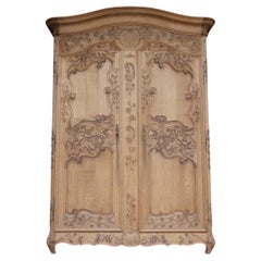 Early 20th Century French Provincial Armoire in Stripped Oak