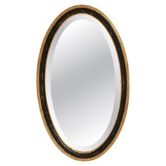 Early 20th Century French Provincial Oval Mirror, Black Giltwood Frame