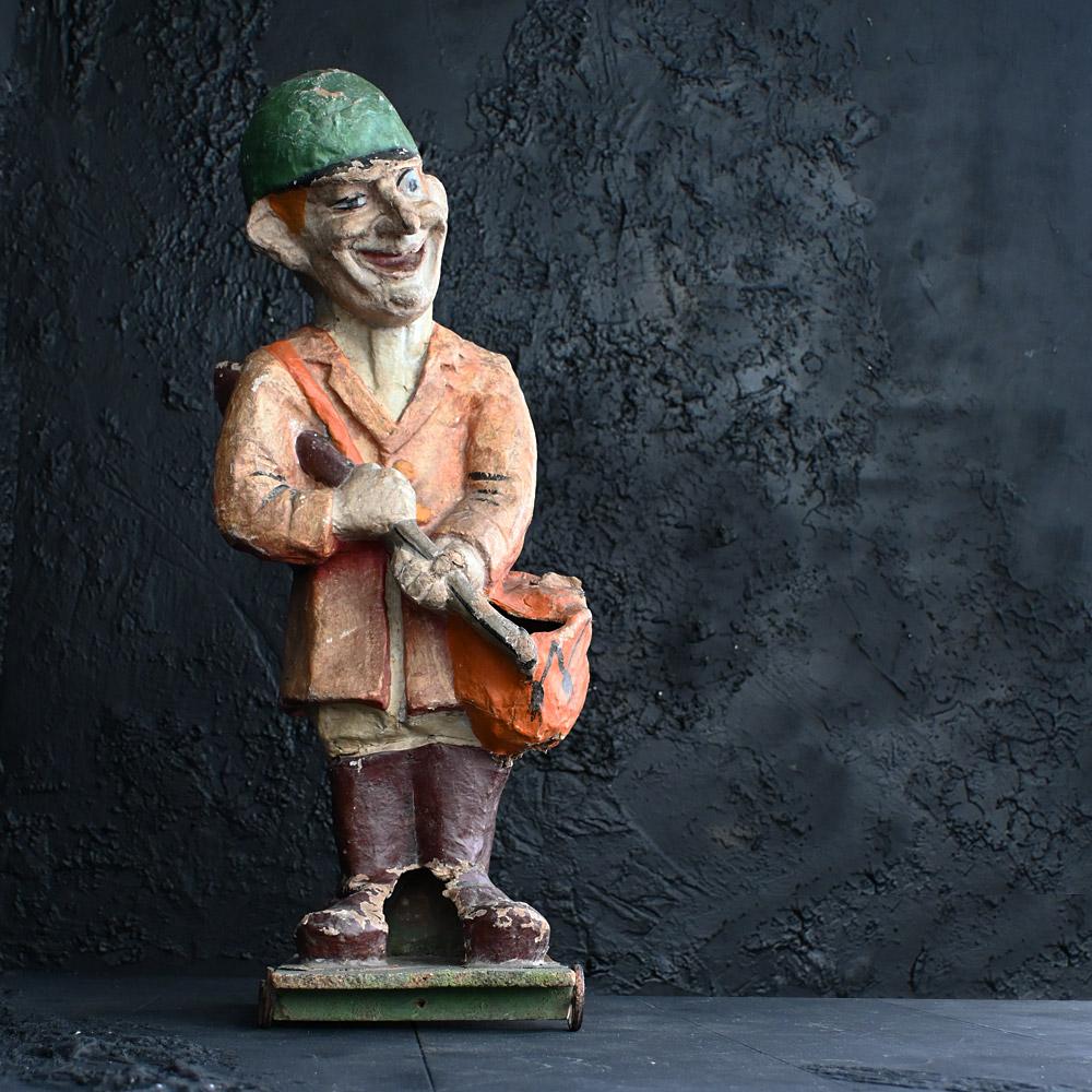 Early-20th Century French Pull along papier Mache figure
A very quirky hand-crafted example of an early-20th Century papier Mache French pull along figure. Securely stood on a pine base with metal wheels. The huntsman figure with gun in hand has a