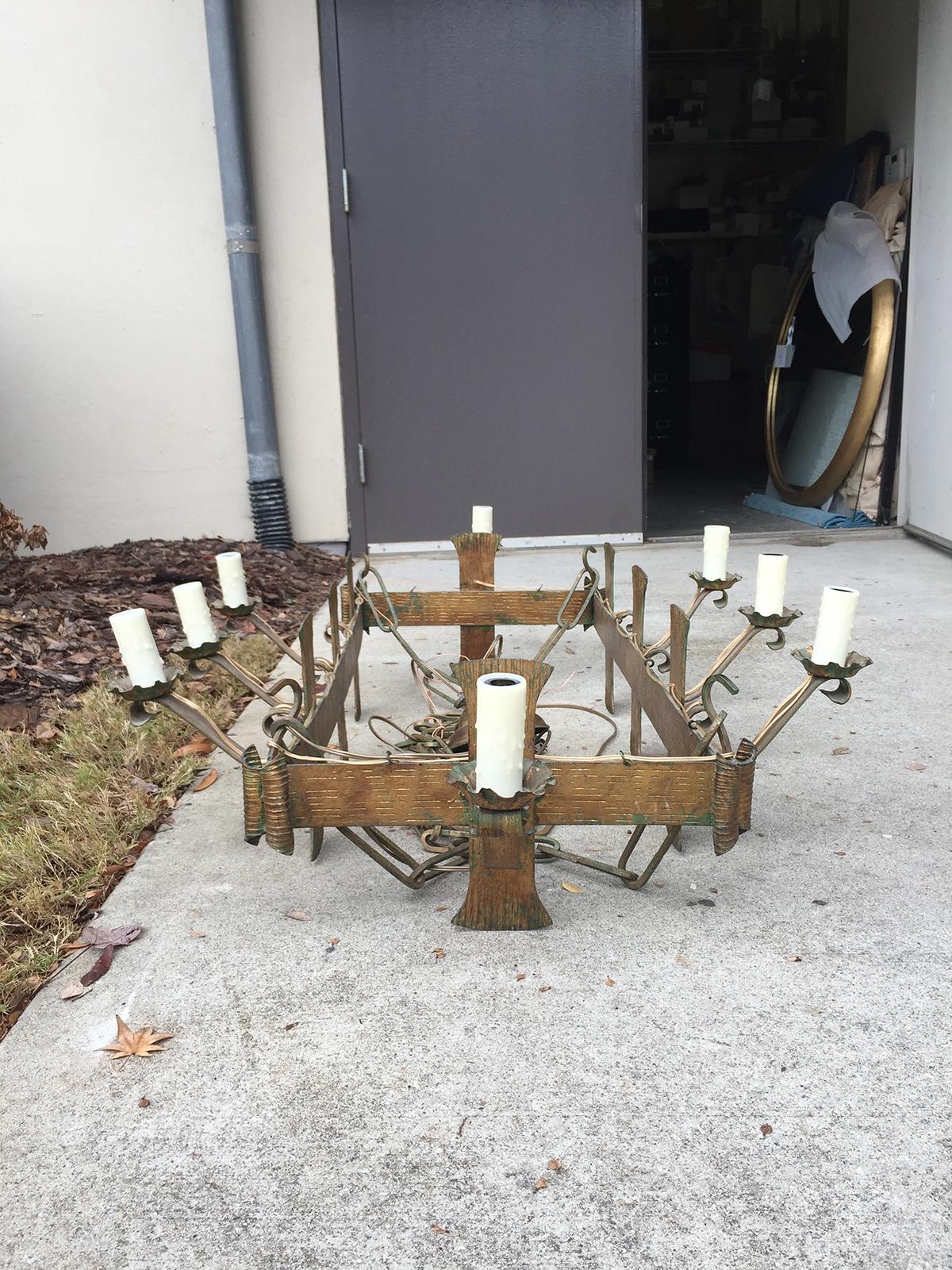 Early 20th century French rectangular hand forged chandelier, old gold finish.
Brand new wiring.