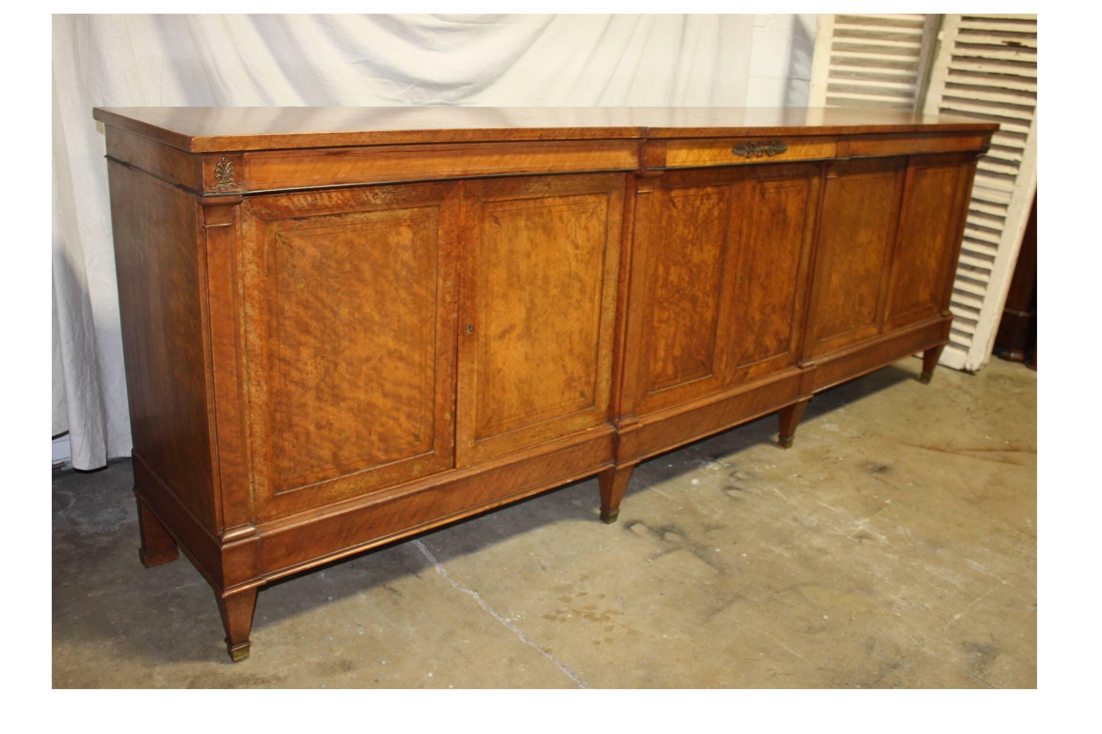 Early 20th century French sideboard, Directoire style. The wood is a beautiful burl of walnut.