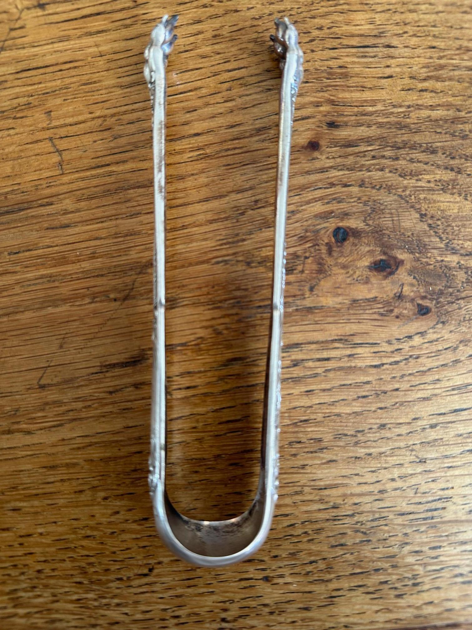 Set di 12 cucchiai e una pinza in argento francese dell'inizio del XX secolo in vendita 10
