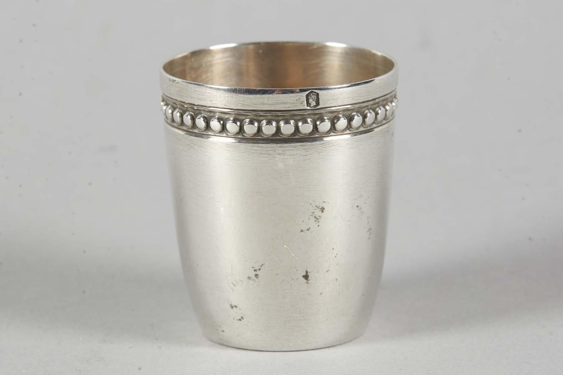 Sterling silver Zionist Schnapps cup, France, circa 1920. 
This shot cup is decorated with a Star of David enclosed in a wreath with a bow, and the word “Zion” in Hebrew. Marked with French silver hallmarks.
This was most likely a “giveaway” to
