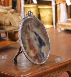 Miroir de courtoisie français du début du 20e siècle en métal argenté sur nickel avec écusson en forme de noeud