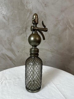 Early 20th Century French Sparklets Wire-Mesh Glass Soda Siphon