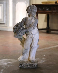 Early 20th Century French Stone Garden Statue of Young Boy Holding Grapes