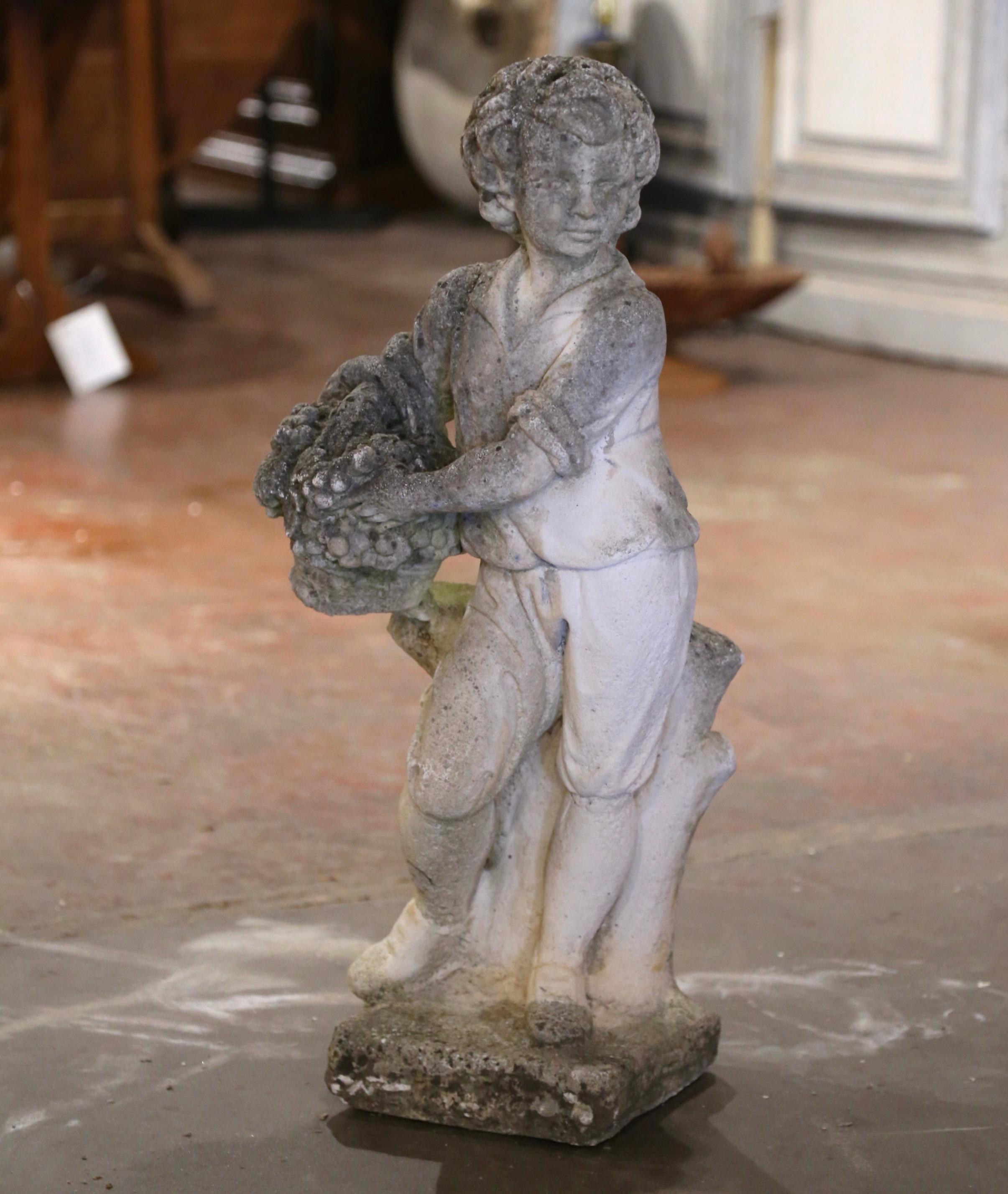 Early 20th Century French Stone Garden Statue of Young Boy Holding Grapes In Excellent Condition For Sale In Dallas, TX