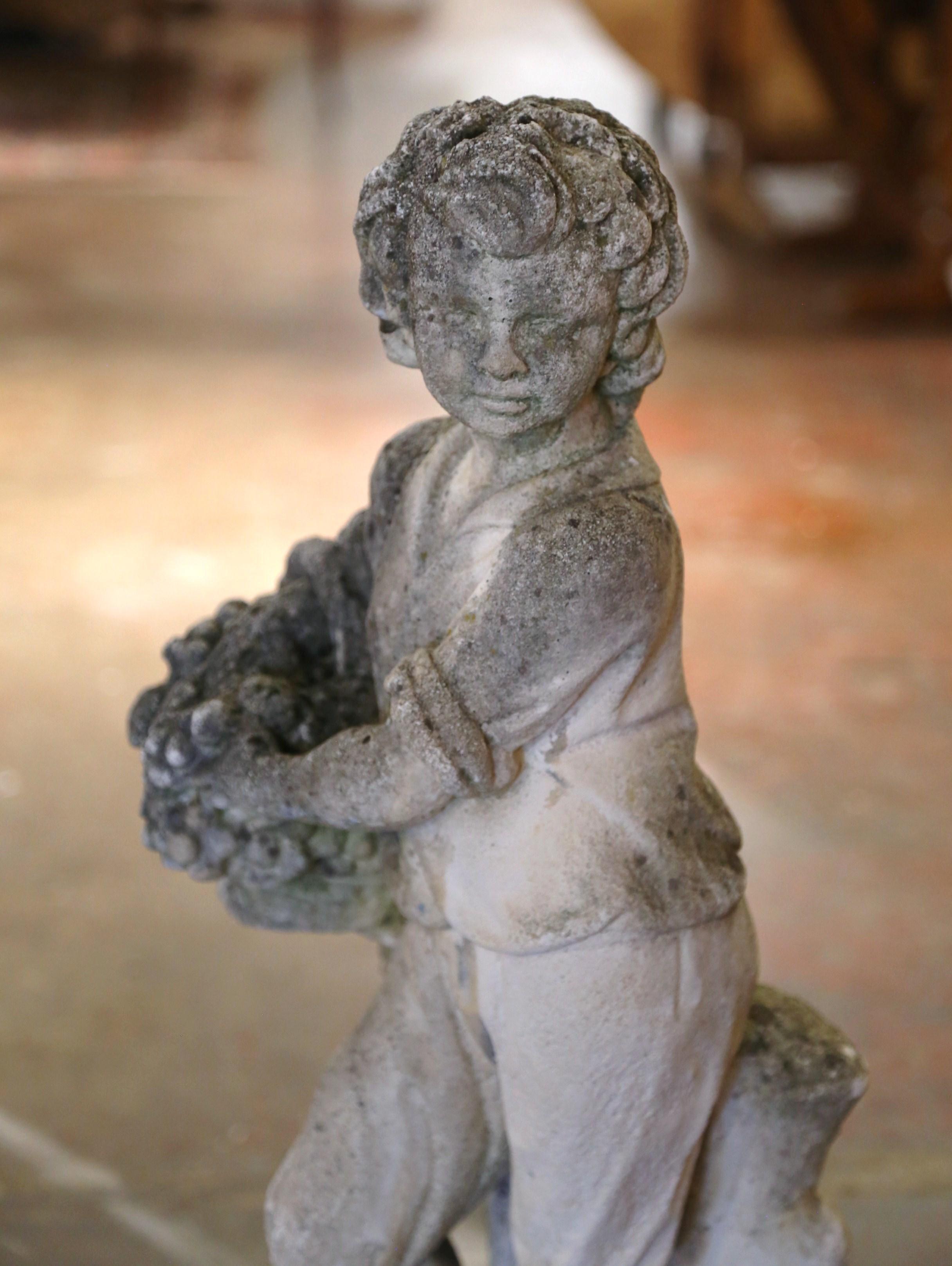 Cast Stone Early 20th Century French Stone Garden Statue of Young Boy Holding Grapes For Sale