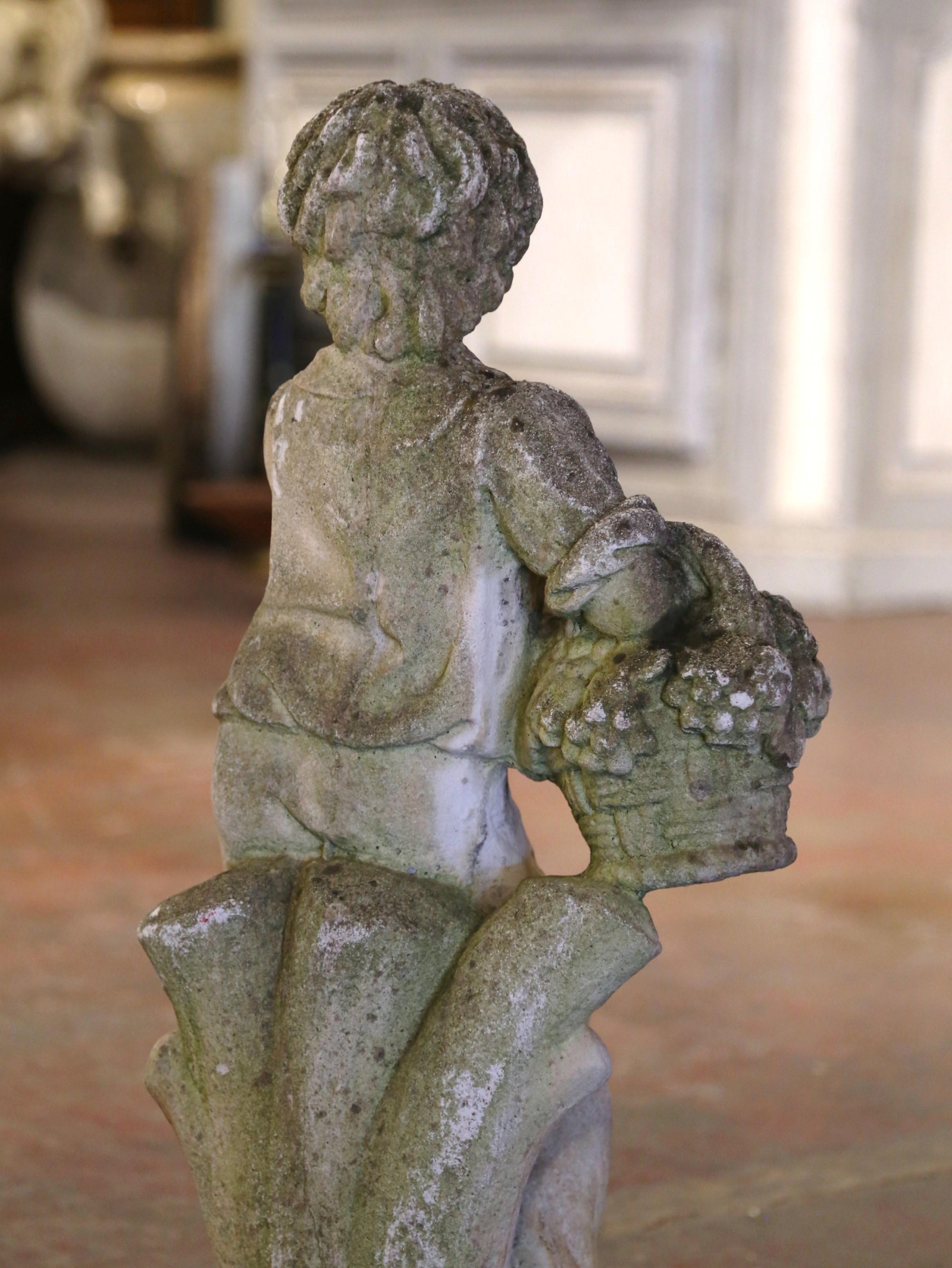 Early 20th Century French Stone Garden Statue of Young Boy Holding Grapes For Sale 2