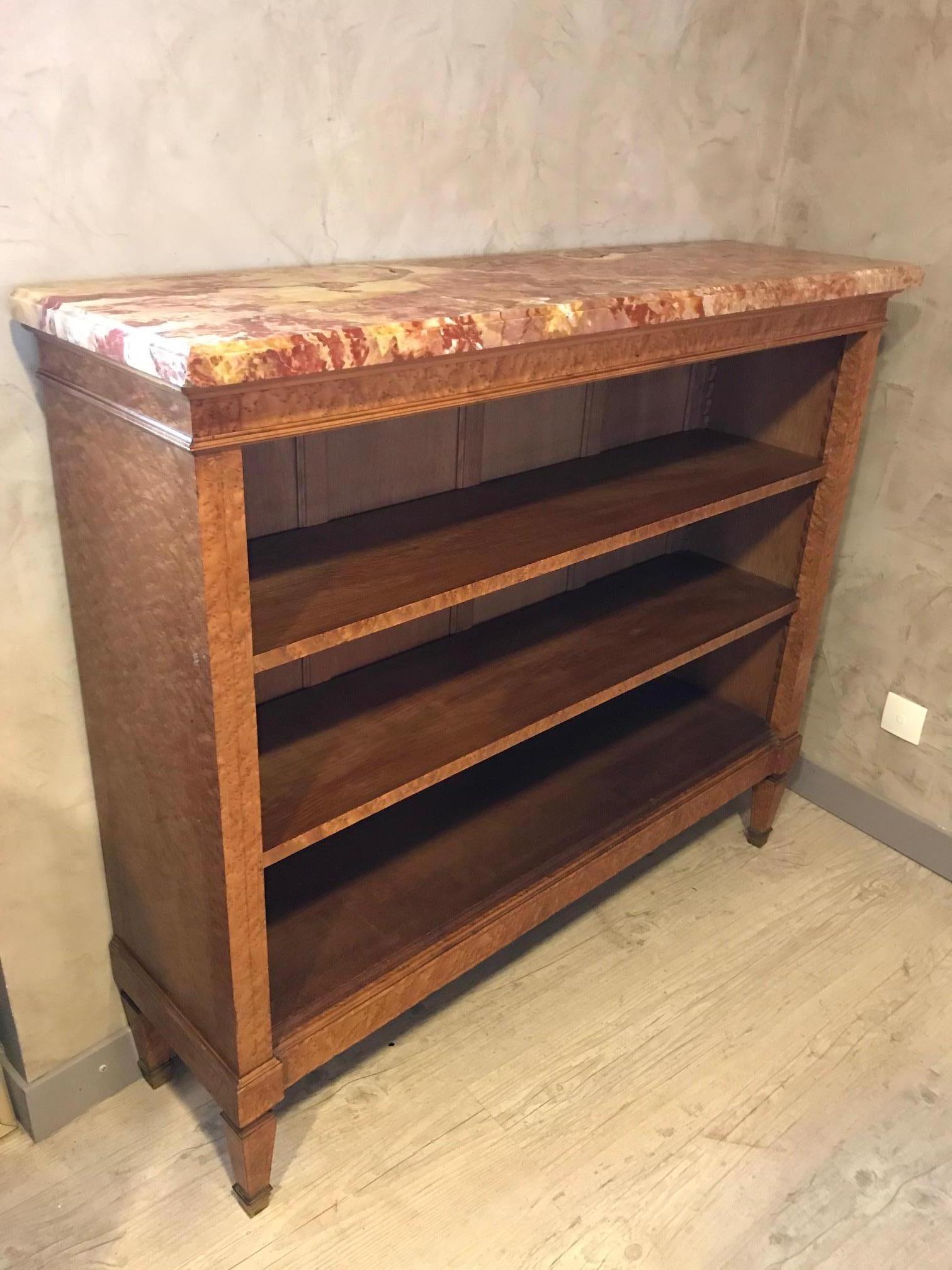 Very nice and rare French sycamore veneer and marble top bibliotheque from the 1920s.
Two large shelves.
Gilded brass mouthpiece base. Marble top removable. Very elegant and delicacy marquetry on the front.
Ideal in an office.
Nice quality.