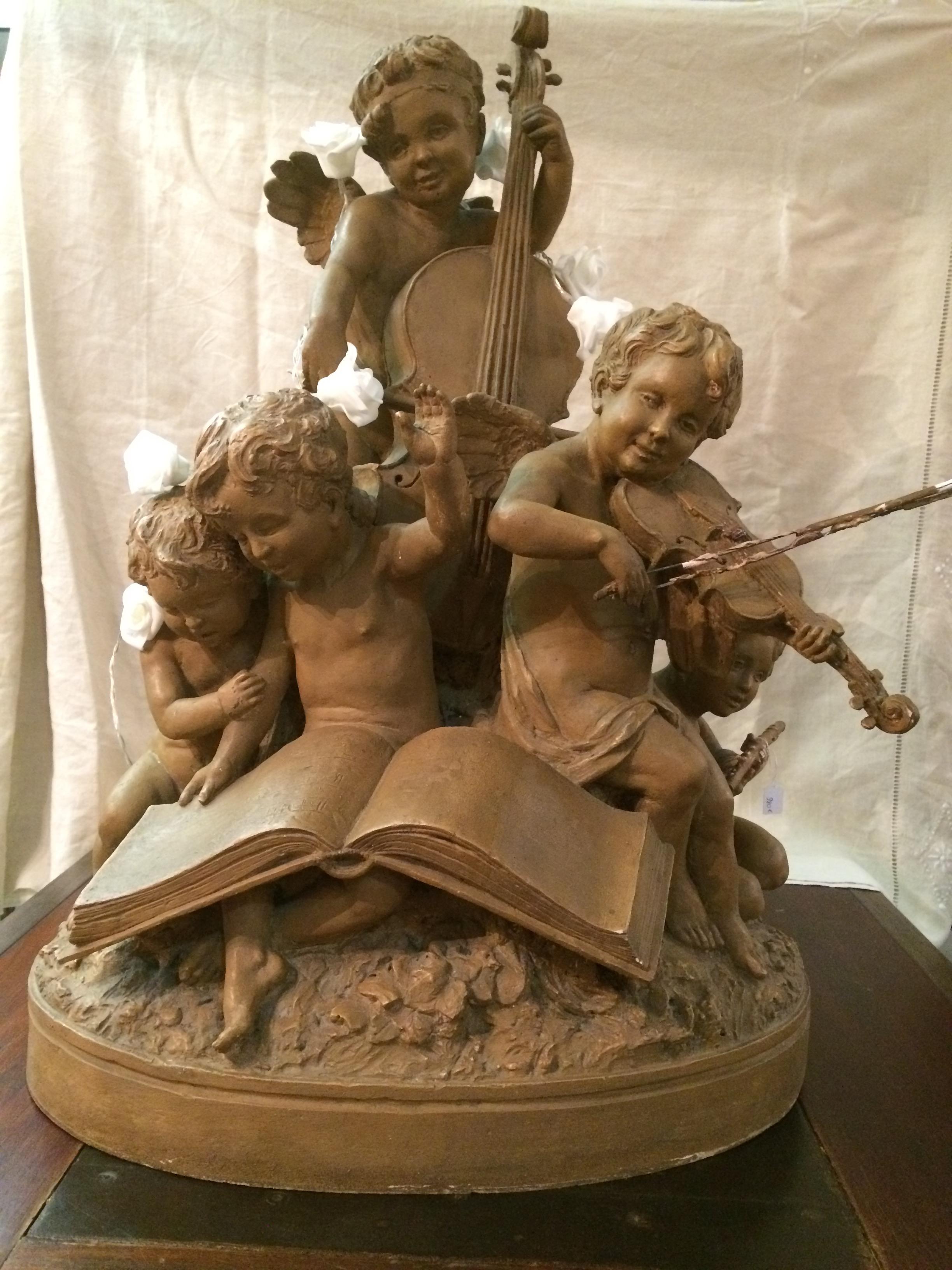Early 20th Century French Terracotta Musician Angels Statue Signed Delaspre In Fair Condition For Sale In LEGNY, FR