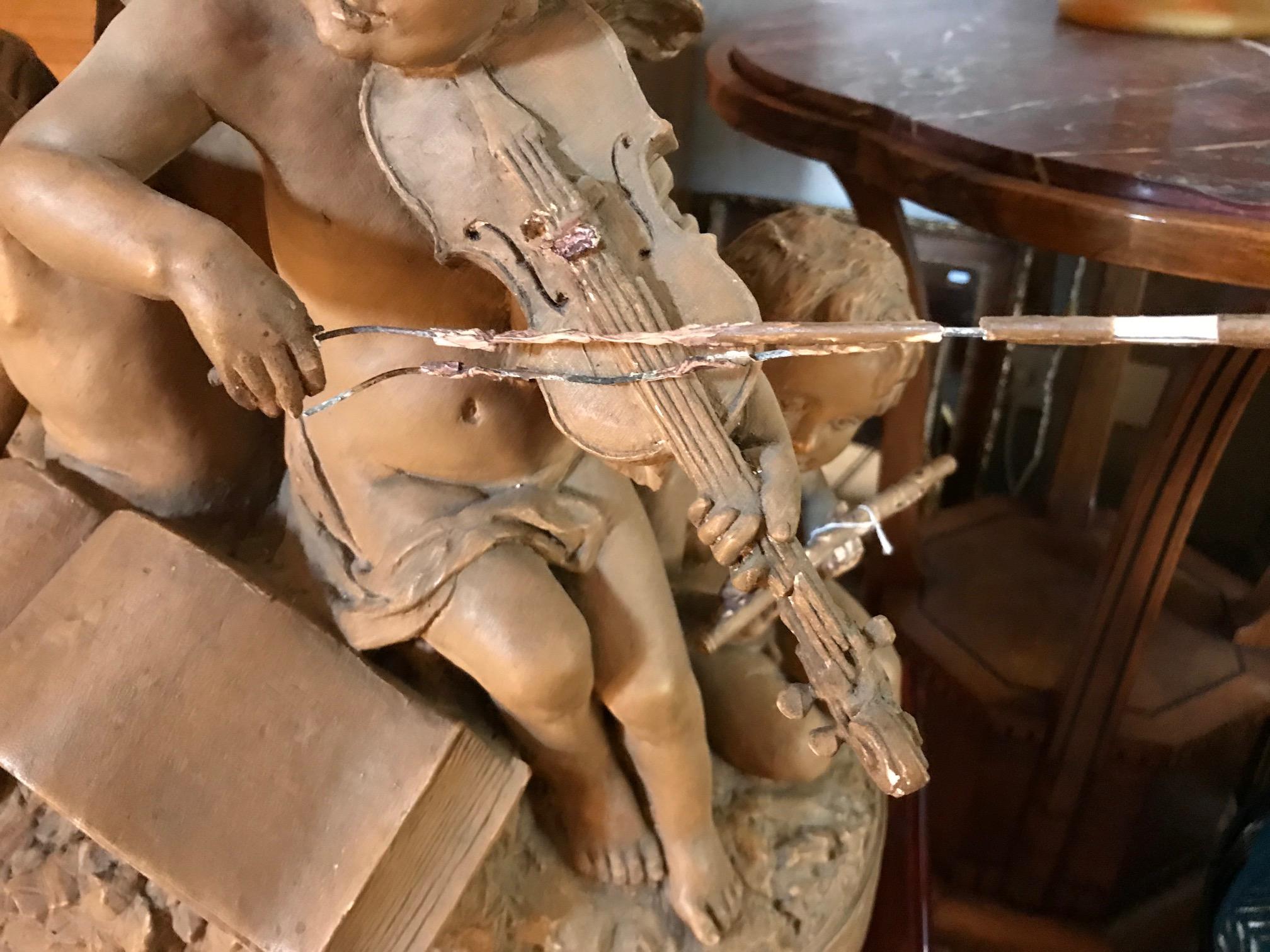 Statue d'anges musiciens en terre cuite du début du 20e siècle signée Delaspre 1