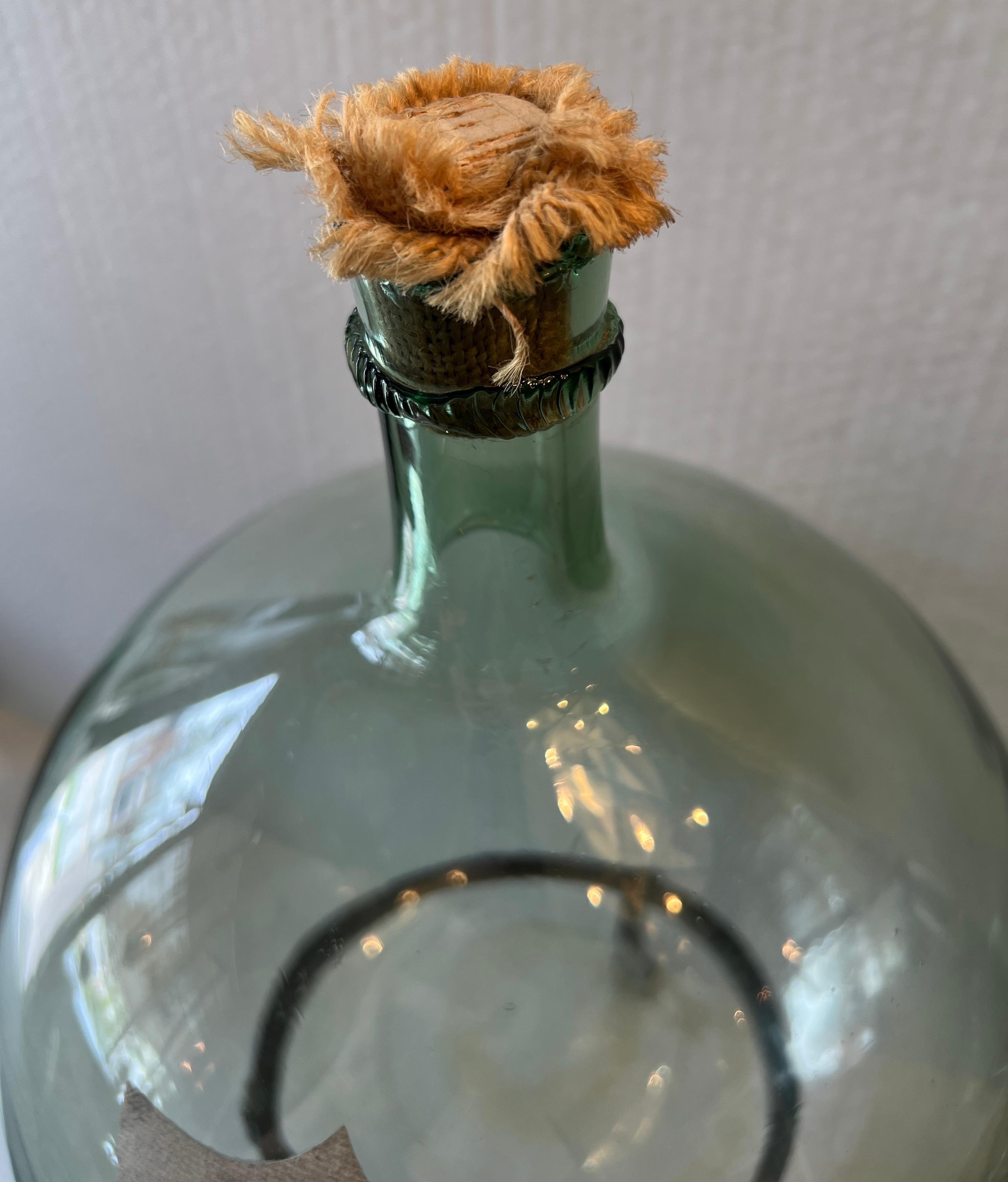 Demijohn en verre vert 