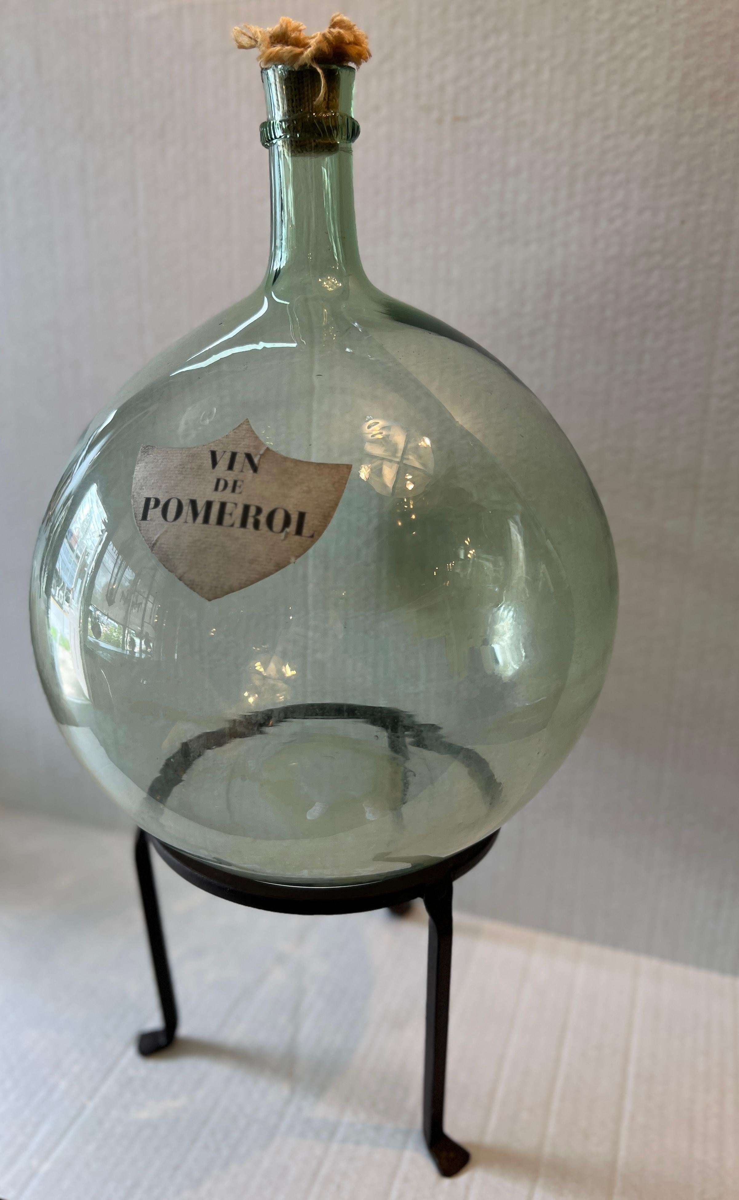 Demijohn en verre vert 