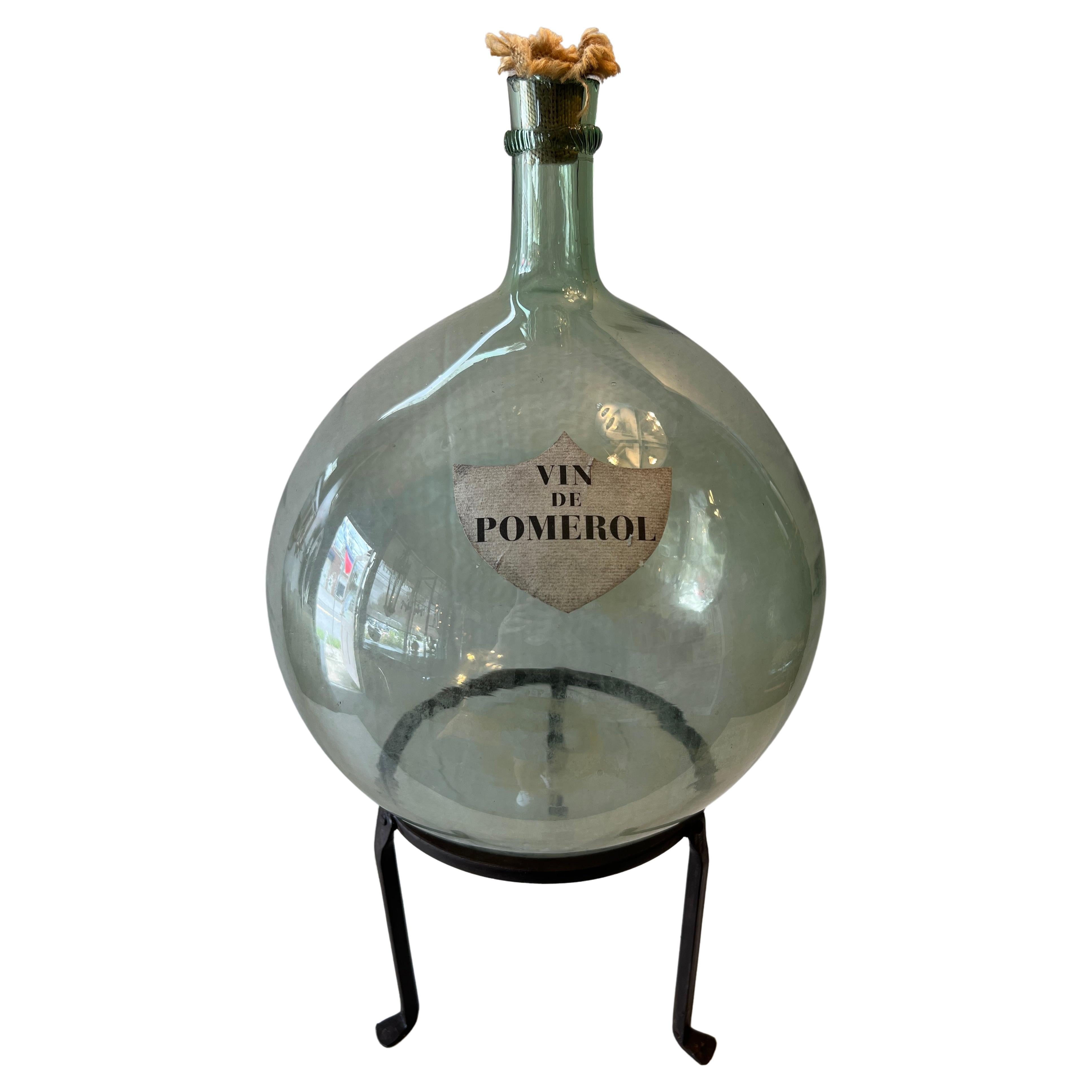 Demijohn en verre vert "Vin de Pomerol" français du début du 20e siècle  en vente
